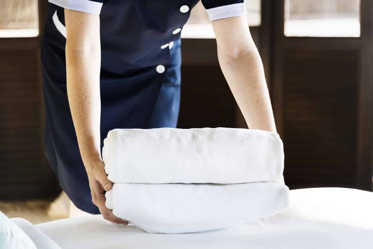 Housekeeping staff cleaning towels at Days Inn in Port Charlotte